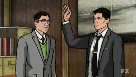 Two Men In Suits And Ties Waving Hand GIF