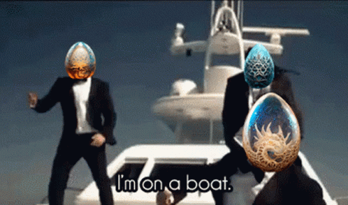 Two Men In Suits Are Dancing In Front Of A Boat With The Words " I 'M On A Boat " On The Bottom GIF