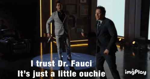 Two Men In Suits Are Dancing With The Words I Trust Dr. Fauci It 'S Just A Little Ouchie Below Them GIF