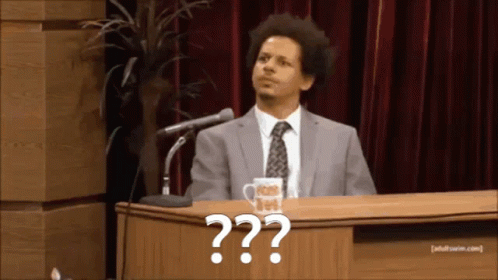 Two Men In Suits At Table With Adult Swim Mug GIF