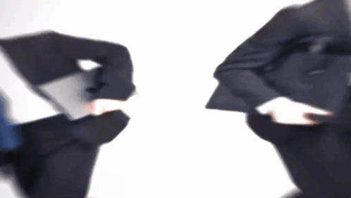 Two Men In Suits Holding Laptops GIF