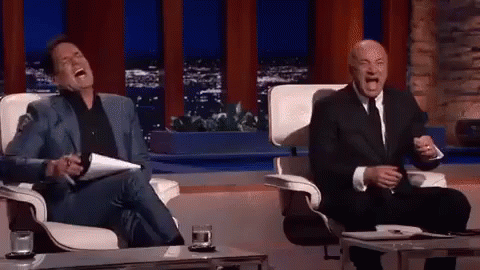 Two Men In Suits Laughing GIF