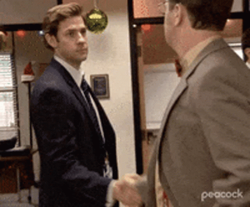 Two Men in Suits Shaking Hands