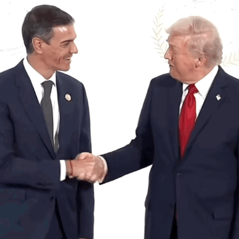 Two Men in Suits Shaking Hands