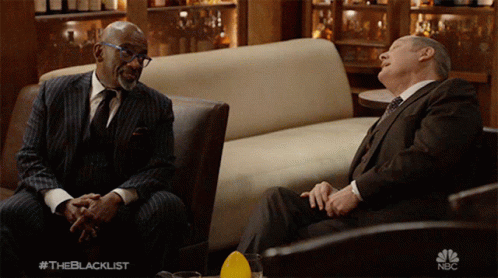Two Men In Suits Sitting On Couch The Blacklist GIF