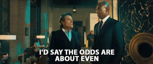 Two Men In Suits Standing Next To Each Other With The Words " I 'D Say The Odds Are About Even " On The Bottom GIF