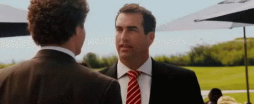 Two Men in Suits Talking