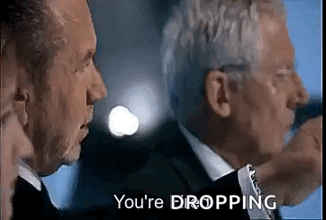 Two Men In Suits Talking GIF