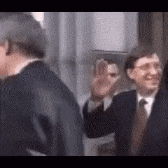 Two Men in Suits Waving