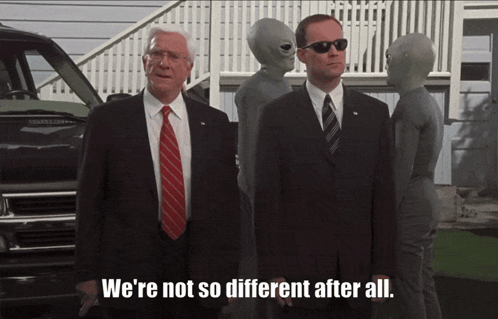 Two Men In Suits We're Not So Different After All GIF