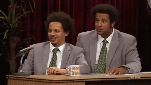 Two Men In Suits With Adult Swim Mug GIF