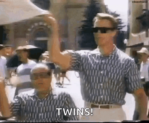 Two Men in Sunglasses and Striped Shirts