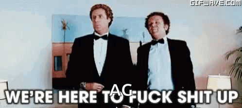 Two Men In Tuxedos And Bow Ties Are Standing Next To Each Other In A Room . GIF