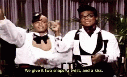 Two Men In Tuxedos Dancing Saying We Give It Two Snaps GIF