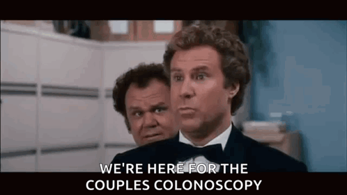 Two Men in Tuxedos Talking About Colonoscopy
