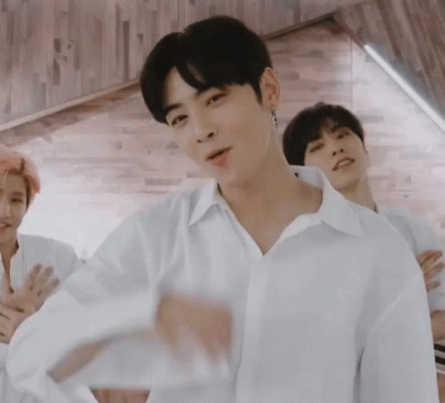 Two Men in White Shirts Standing Together