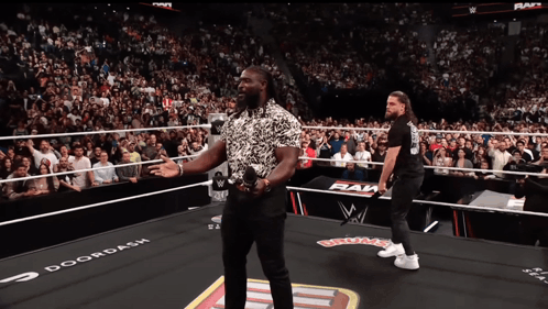 Two Men in Wrestling Ring with Doordash