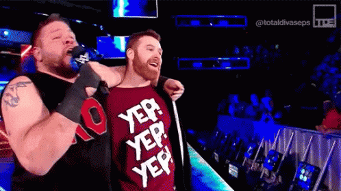 Two Men in Wrestling Ring With Yep Shirt