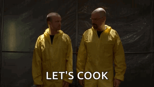 Two Men In Yellow Coveralls Are Standing Next To Each Other With The Words Let 'S Cook Written On The Bottom GIF