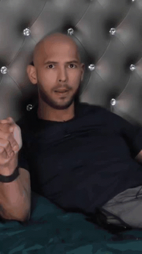 Two Men Kissing In Front Of Line TV Screen GIF