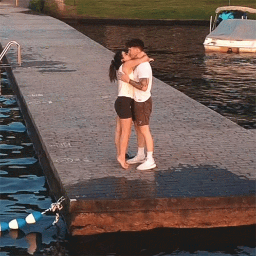 Two Men Kissing On Cheek GIF