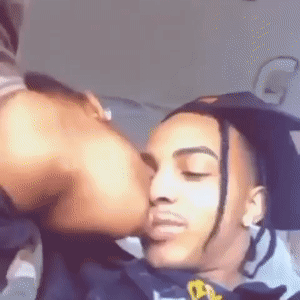 Two Men Kissing on Cheek