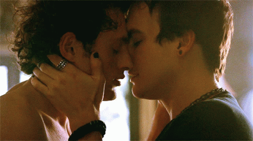 Two Men Kissing One Wearing Ring