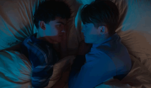 Two Men Laying In Bed With The Words I Wanna Stay Up All Night GIF