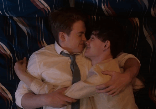 Two Men Laying On A Bed With The Words Aaugh My Plan 'S Been Foiled Below Them GIF