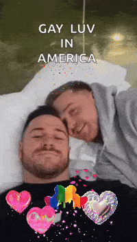 Two Men Laying on Bed Gay Luv in America