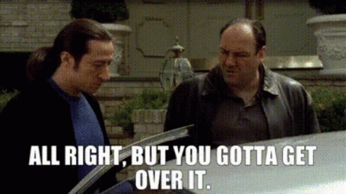 Two Men Next to Car Saying All Right But You Gotta Get Over It
