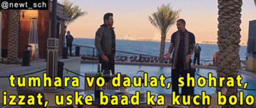 Two Men Next to Pool With Caption