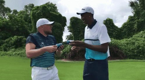 Two Men On Golf Course Shirt Says Lacoste GIF
