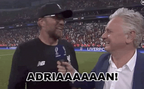 Two Men on Soccer Field Saying Adriaaaan