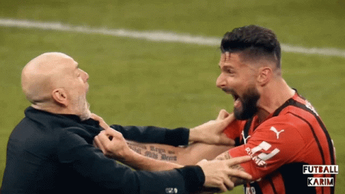 Two Men On Soccer Field With Futball Karim GIF