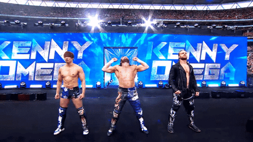 Two Men One Wearing Impact Championship Belt