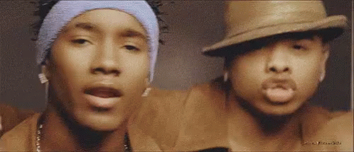 Two Men One With Hat And Headband GIF