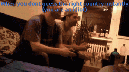 Two Men Playing A Video Game With The Caption When You Dont Guess The Right Country Instantly GIF