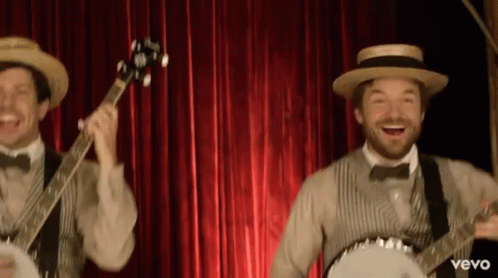 Two Men Playing Banjo And Guitar With Vevo GIF