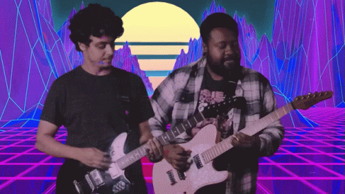 Two Men Playing Guitars In Front Of A Colorful Background GIF