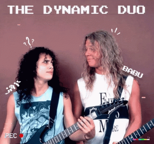 Two Men Playing Guitars In Front Of A Wall With The Dynamic Duo Written On The Bottom GIF