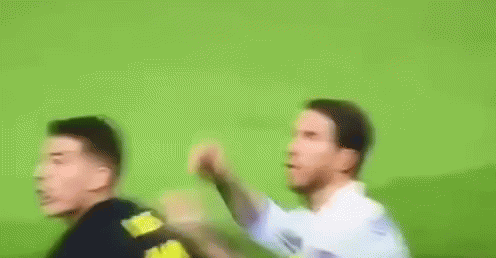 Two Men Playing Soccer