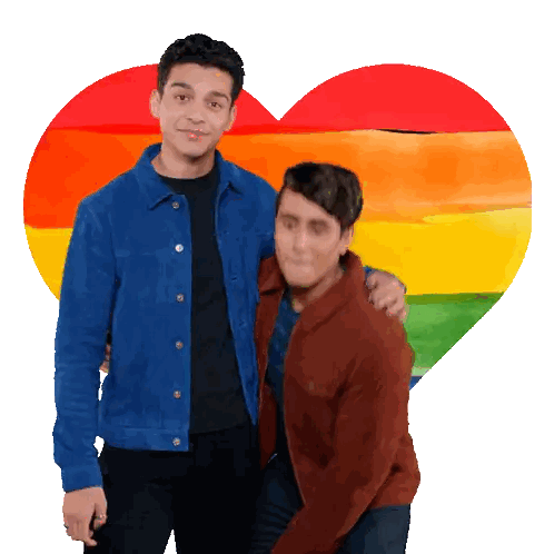 Two Men Posing in Front of Heart Rainbow Flag