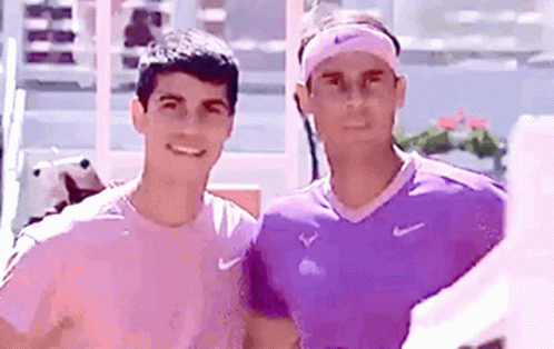 Two Men Posing One Wearing Headband GIF