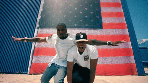 Two Men Posing With American Flag And NY Hat GIF