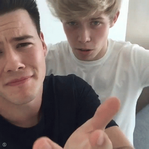 Two Men Posing With Funny Face GIF