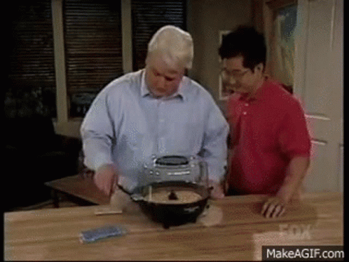 Two Men Preparing Food Fox