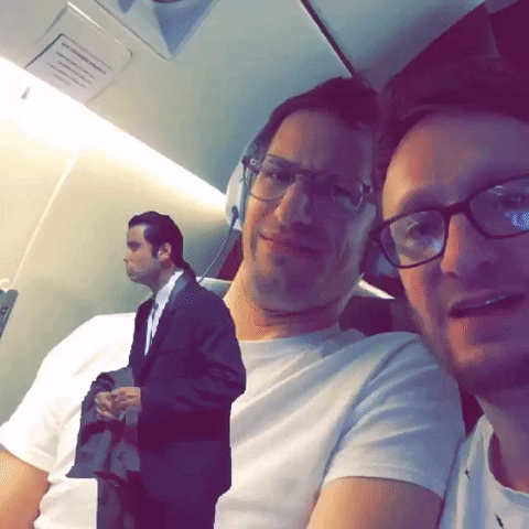 Two Men Reaction To Confused Actor John Travolta GIF