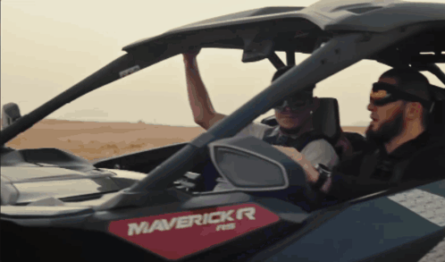 Two Men Riding In A Maverick RR ATV GIF
