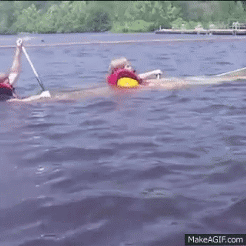 Two Men Row The Boat While Sinking GIF